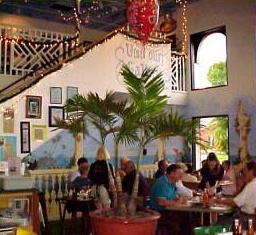 Lunch tables around a potted palm in Habana Café, 2001